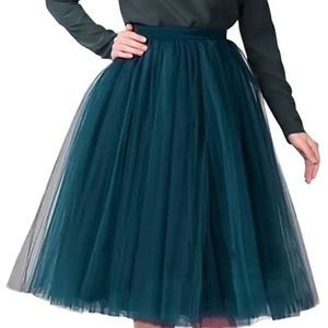 Teal mid length tulle skirt. Perfect for the holidays or a fancy event!